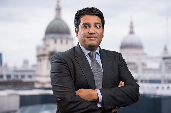 Corporate headshot captured in London offices with blurred background. Different corporate headshot styles